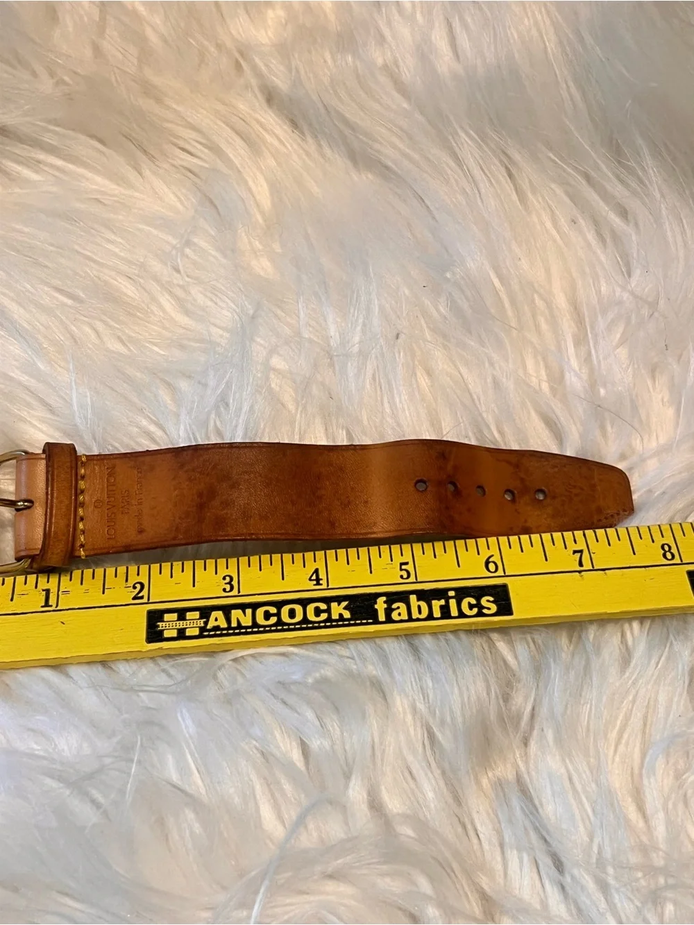 Louis Vuitton elegant tan
